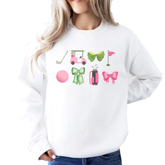 Close-up of girly golf design on women's gray crewneck sweatshirt