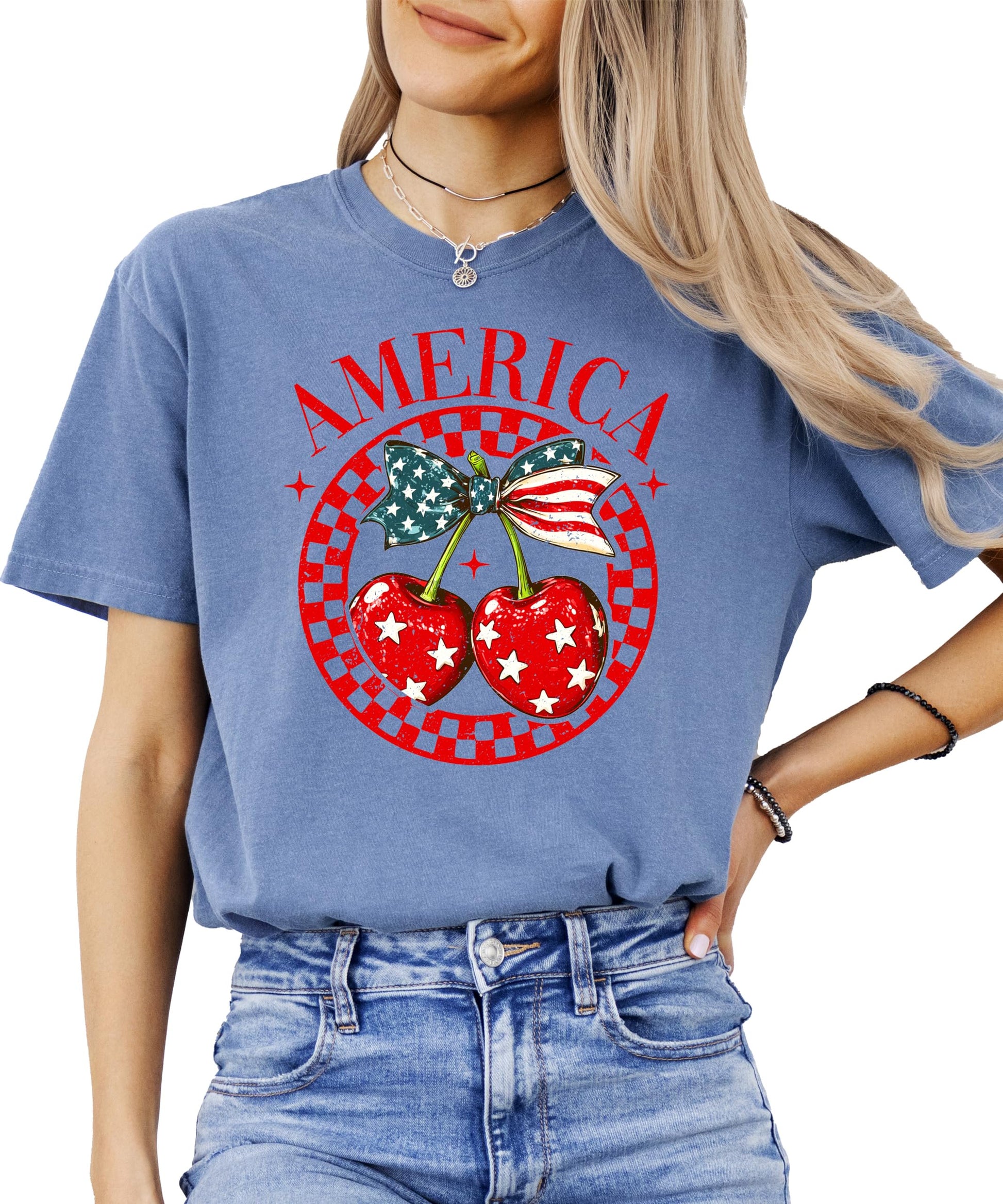 Side view of patriotic cherry bow tee showing shirt fit and design placement