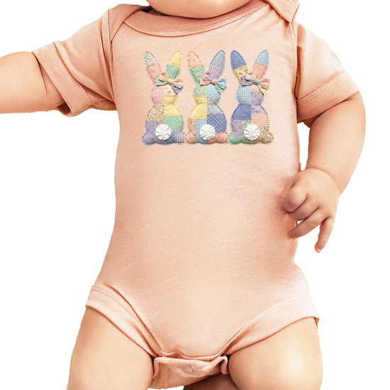 Easter bunny bodysuit displayed on a neutral background showing full front print detail