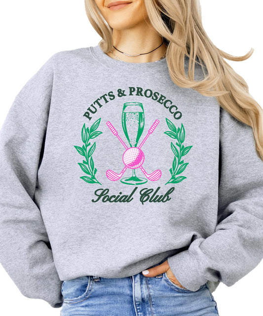 Front view of white Putts and Pros Social Club women's graphic sweatshirt with golf theme