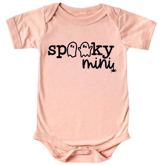 Flat lay of spooky mini ghost Halloween shirt and bodysuit set in vintage burgundy