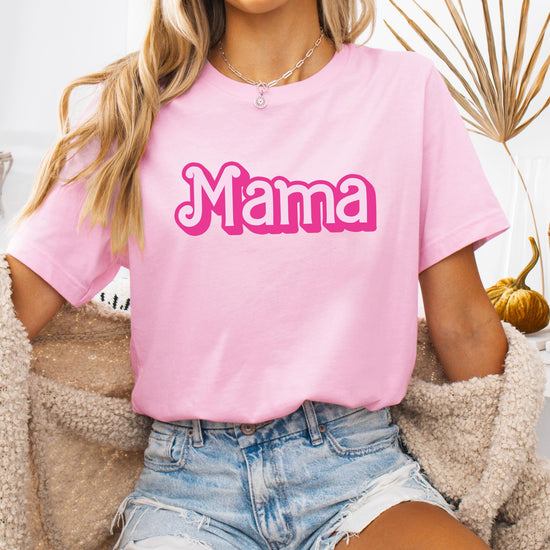 Mother and daughter twinning in pink matching graphic tees from Olive Loves Apple