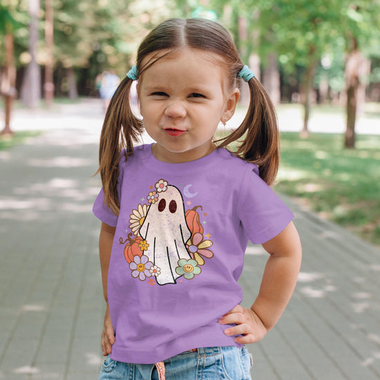 Toddler girl wearing groovy ghost Halloween purple graphic tee