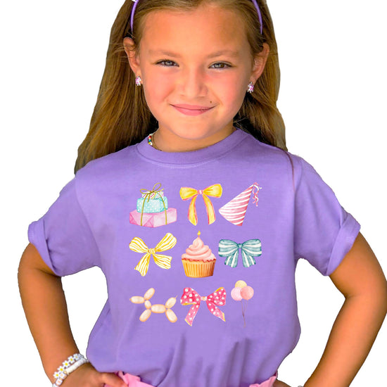 Young girl wearing pink coquette birthday graphic tee styled for a birthday party celebration