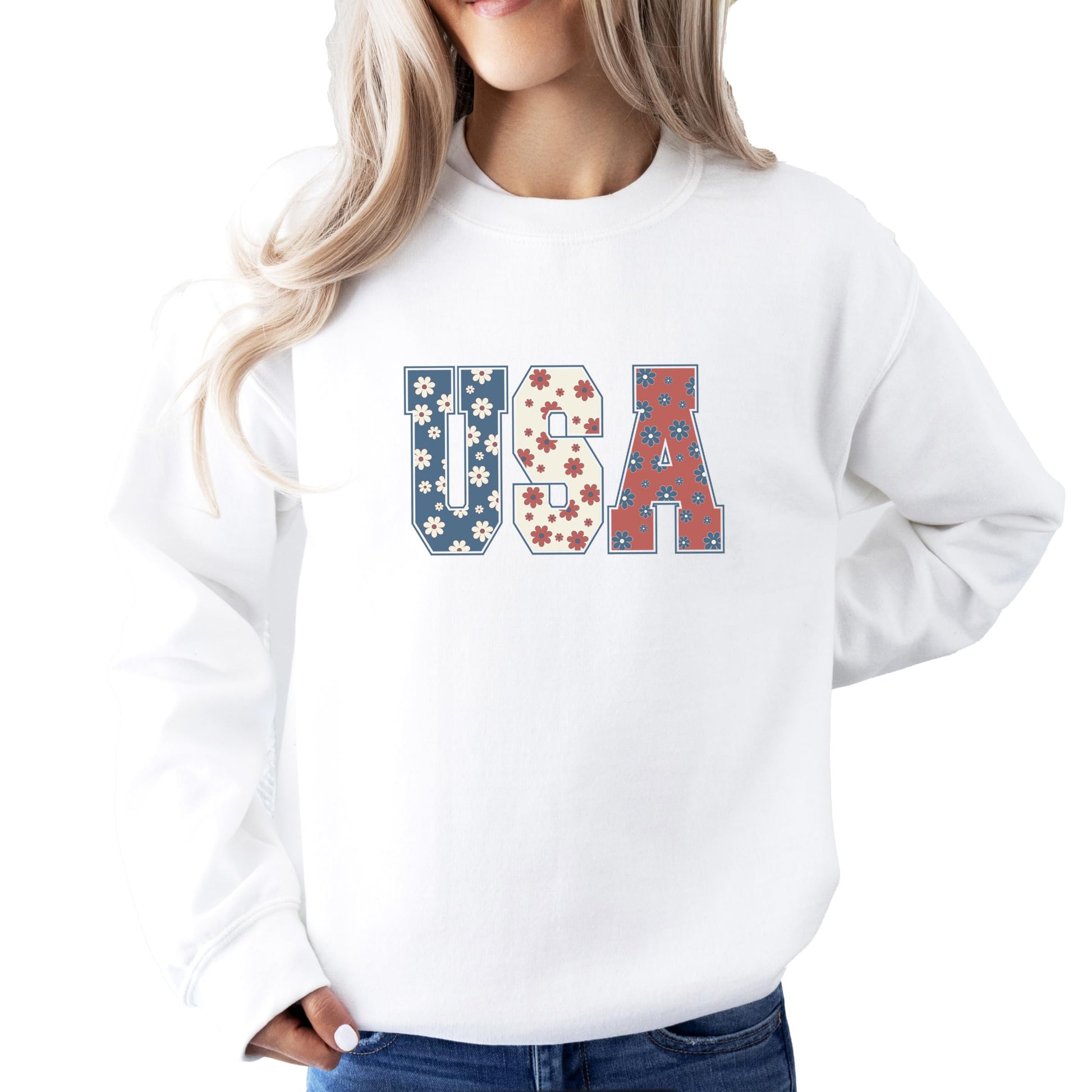 Women's white sweatshirt with red white and blue floral USA graphic design for patriotic occasions