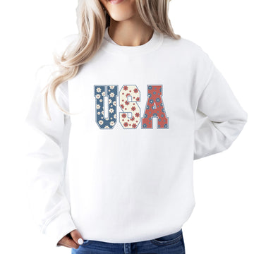 Women's white sweatshirt with red white and blue floral USA graphic design for patriotic occasions