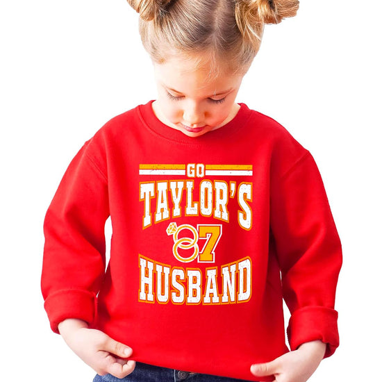 Front view of women's red game day pullover with bold 'Go Taylor's Husband' graphic in collegiate lettering