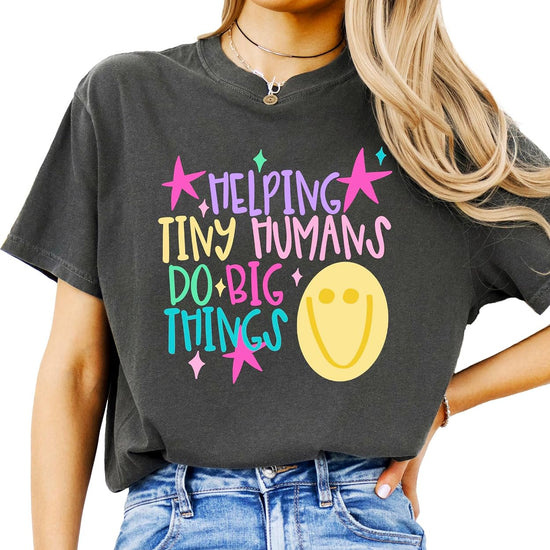 Helping Tiny Humans Do Big Things colorful hand-lettered graphic tee for preschool and kindergarten teachers on garment-dyed Comfort Colors tee