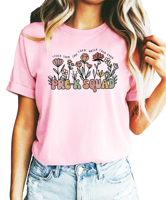 Women's peach Pre-K Squad teacher t-shirt with retro floral design and 'Teach Them Love Them Watch Them Grow' graphic