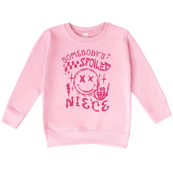 Somebody's Spoiled Niece toddler sweatshirt laid flat showing full graphic design in pink