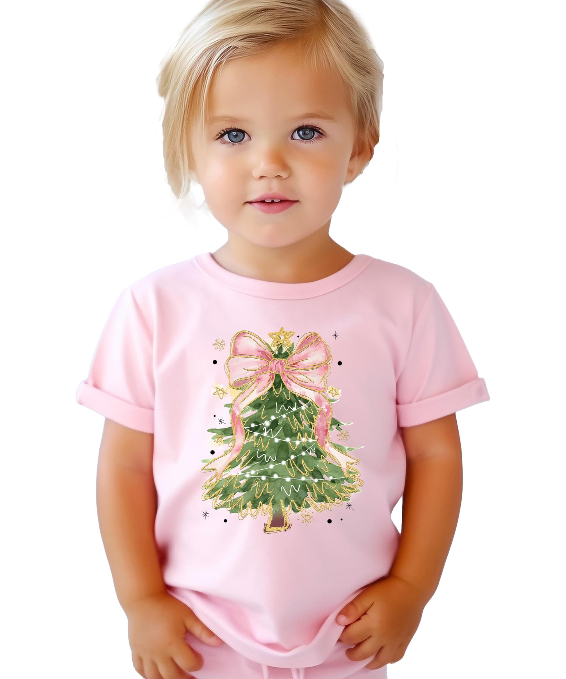 Detail shot of vibrant Christmas tree pink bow graphic print on women's holiday tee