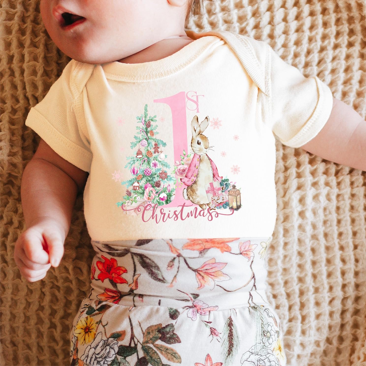 Close-up of bunny First Christmas design printed on a natural infant bodysuit