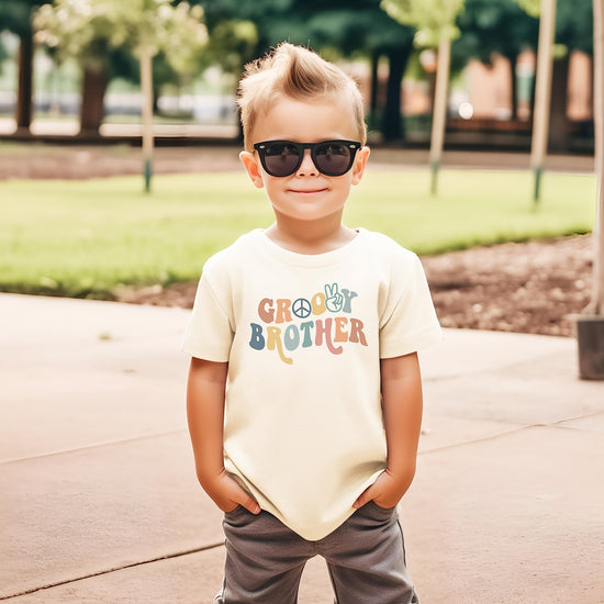 Groovy Mom tee styled as part of a matching family outfit set in natural color