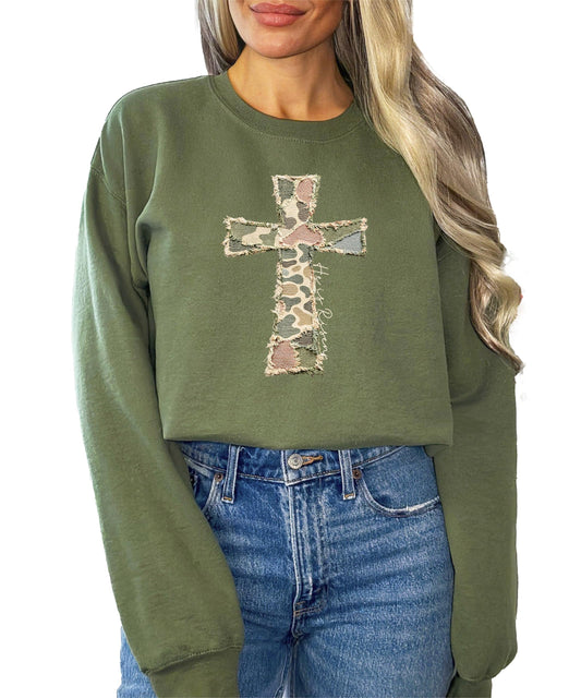 Women's camo He Is Risen cross sweatshirt with bold ink-printed graphic on army green pullover