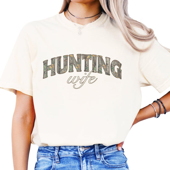 Front view of women's rustic camo deer season graphic tee laid flat
