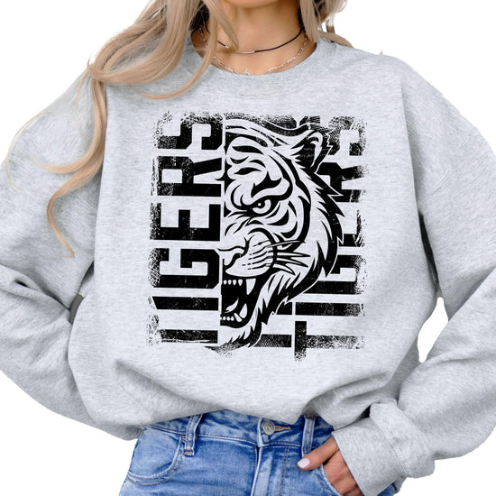 Tigers sports team sweatshirt with fierce tiger face graphic design in bold lettering