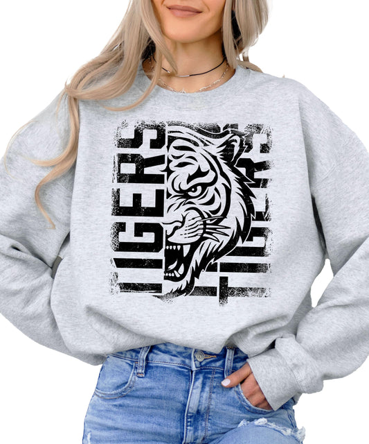 Tigers sports team sweatshirt with fierce tiger face graphic design in bold lettering
