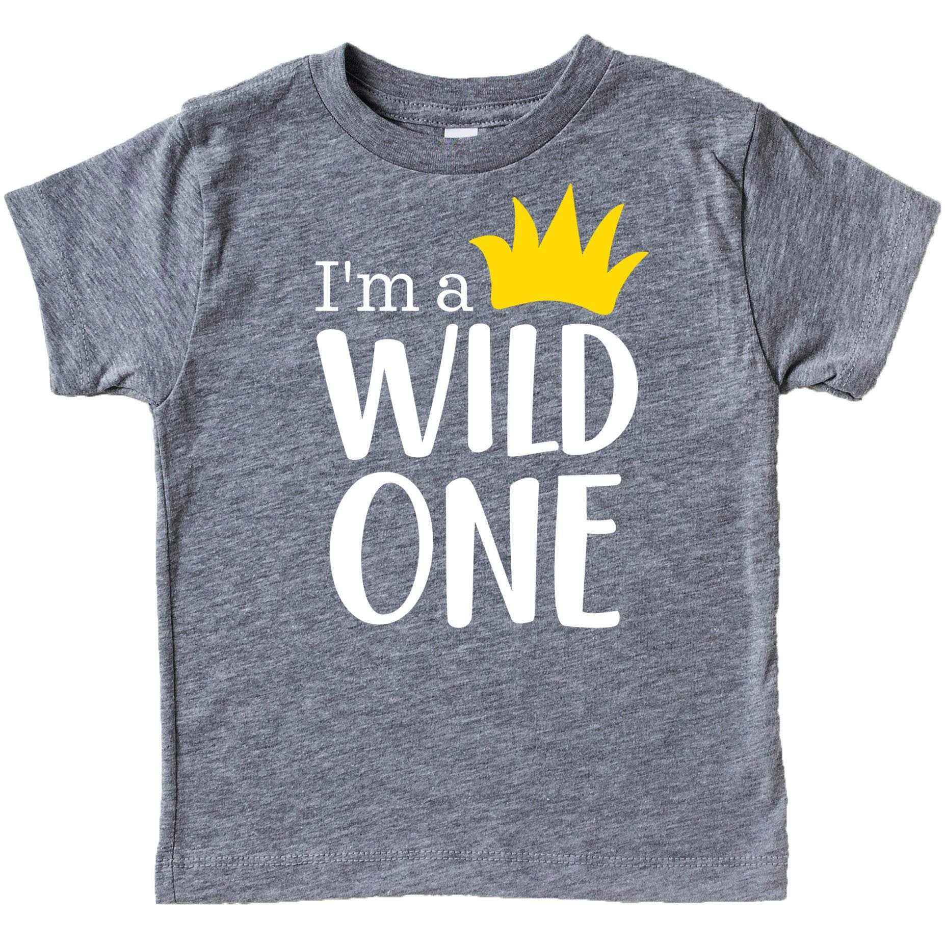 Boys 1st birthday bodysuit laid flat showing Wild One graphic with yellow crown detail