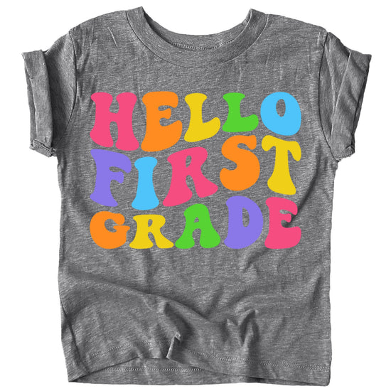 Kids wearing Hello 1st Grade purple graphic tee on first day of school