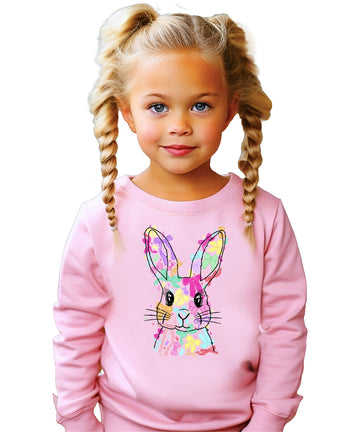 Close-up of colorful coquette bow Easter Bunny graphic print on girls white sweatshirt