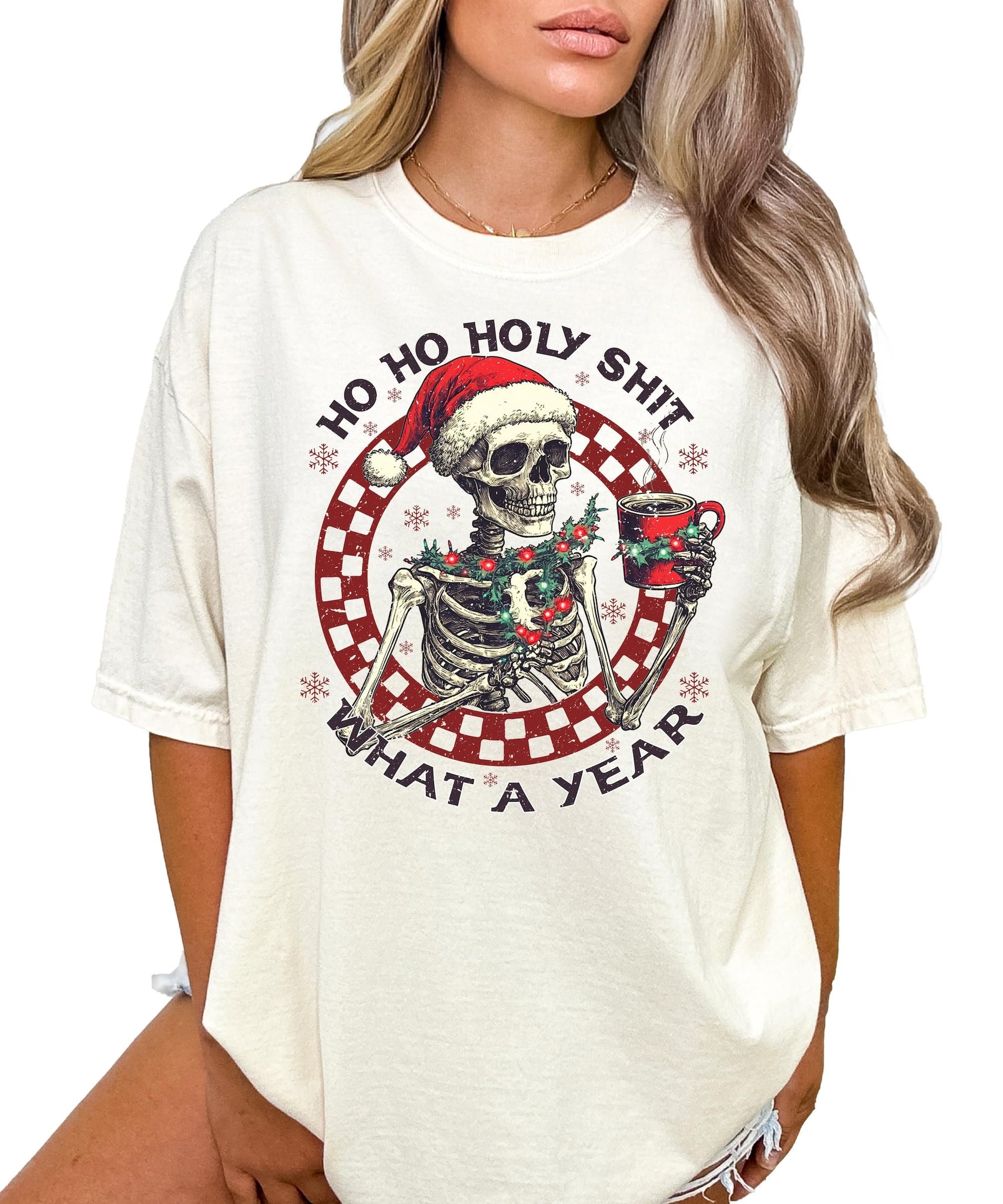 Flat lay of Ho Ho Holy Sh*t What a Year funny Christmas skeleton graphic tee