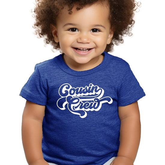 Family wearing matching cousin crew shirts and bodysuits group photo