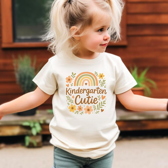 Kindergarten Cutie kids' graphic tee by Olive Loves Apple displayed on white background
