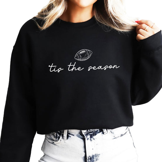 Women's 'Tis the Season football graphic sweatshirt with script lettering and football design