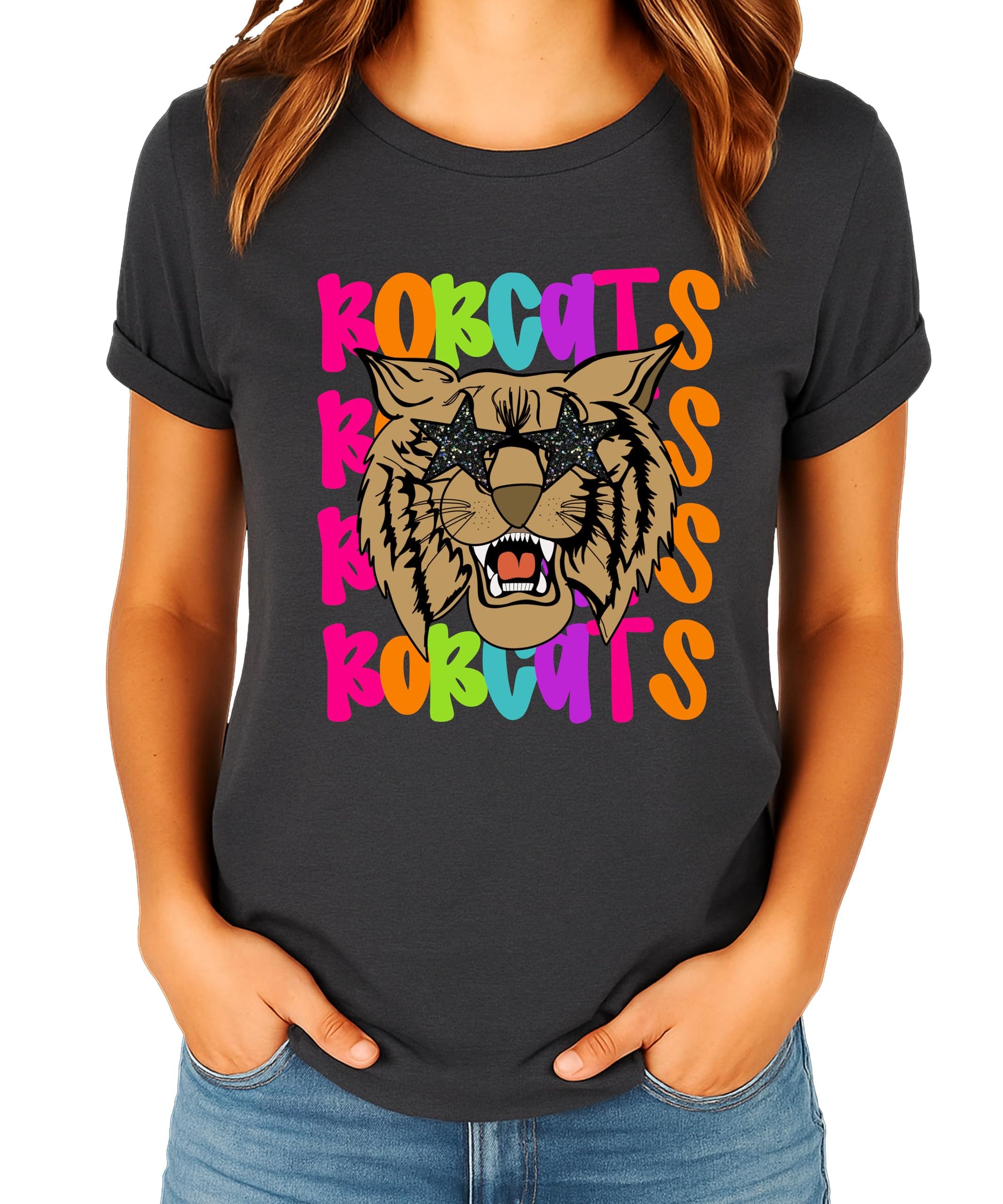 Close-up of Bobcats graphic tee print showing colorful wavy lettering and sparkly sunglasses detail