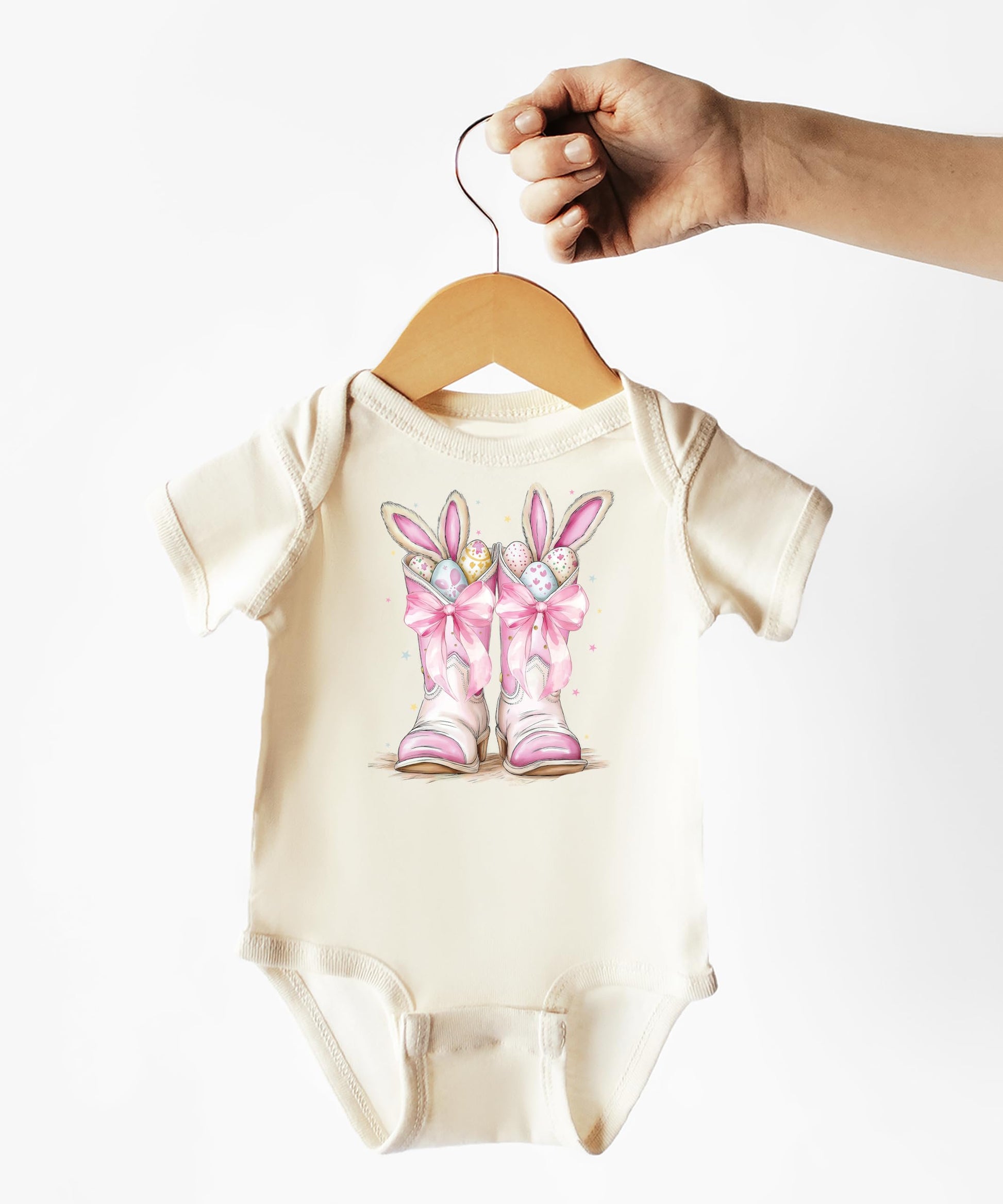 Side detail view of Easter bunny boots baby girl one-piece graphic tee bodysuit