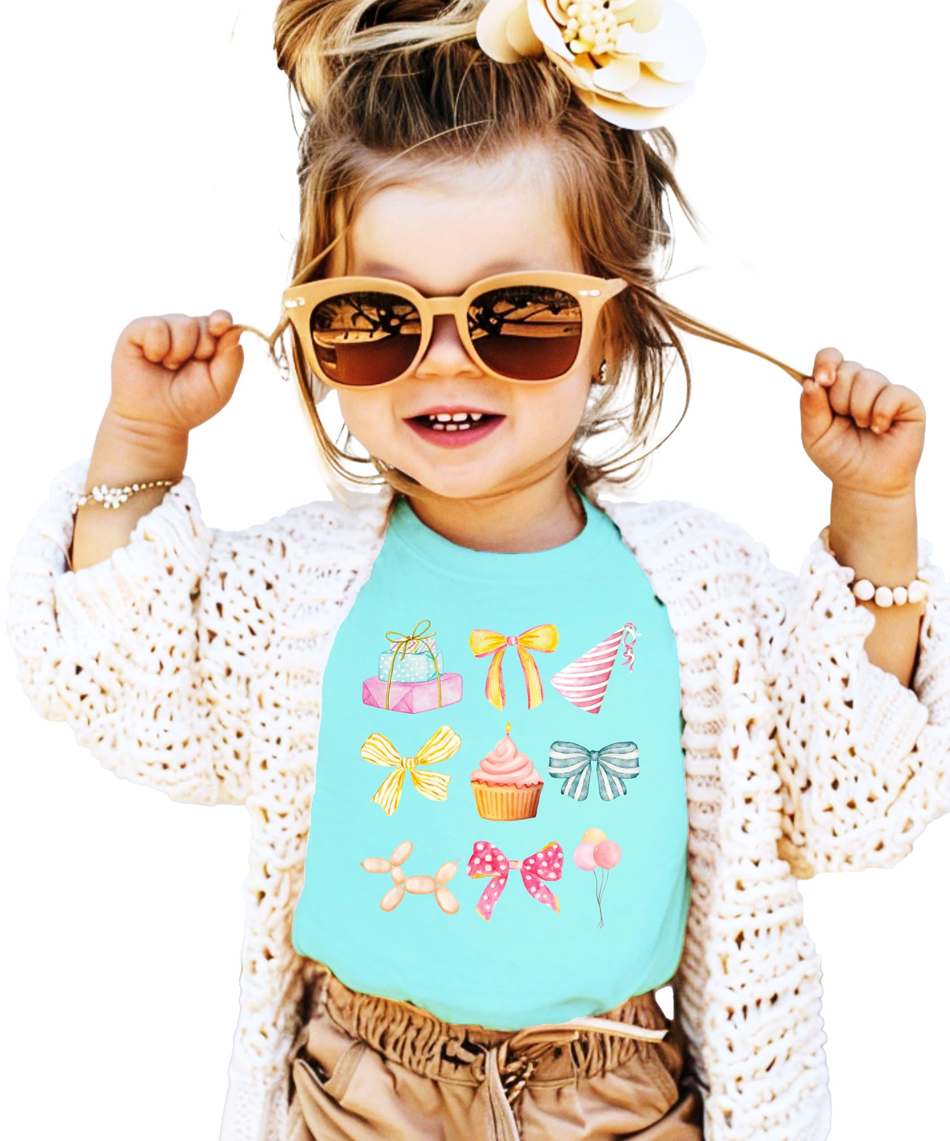Front view of pink coquette birthday t-shirt for girls featuring pastel watercolor party icons and bow details