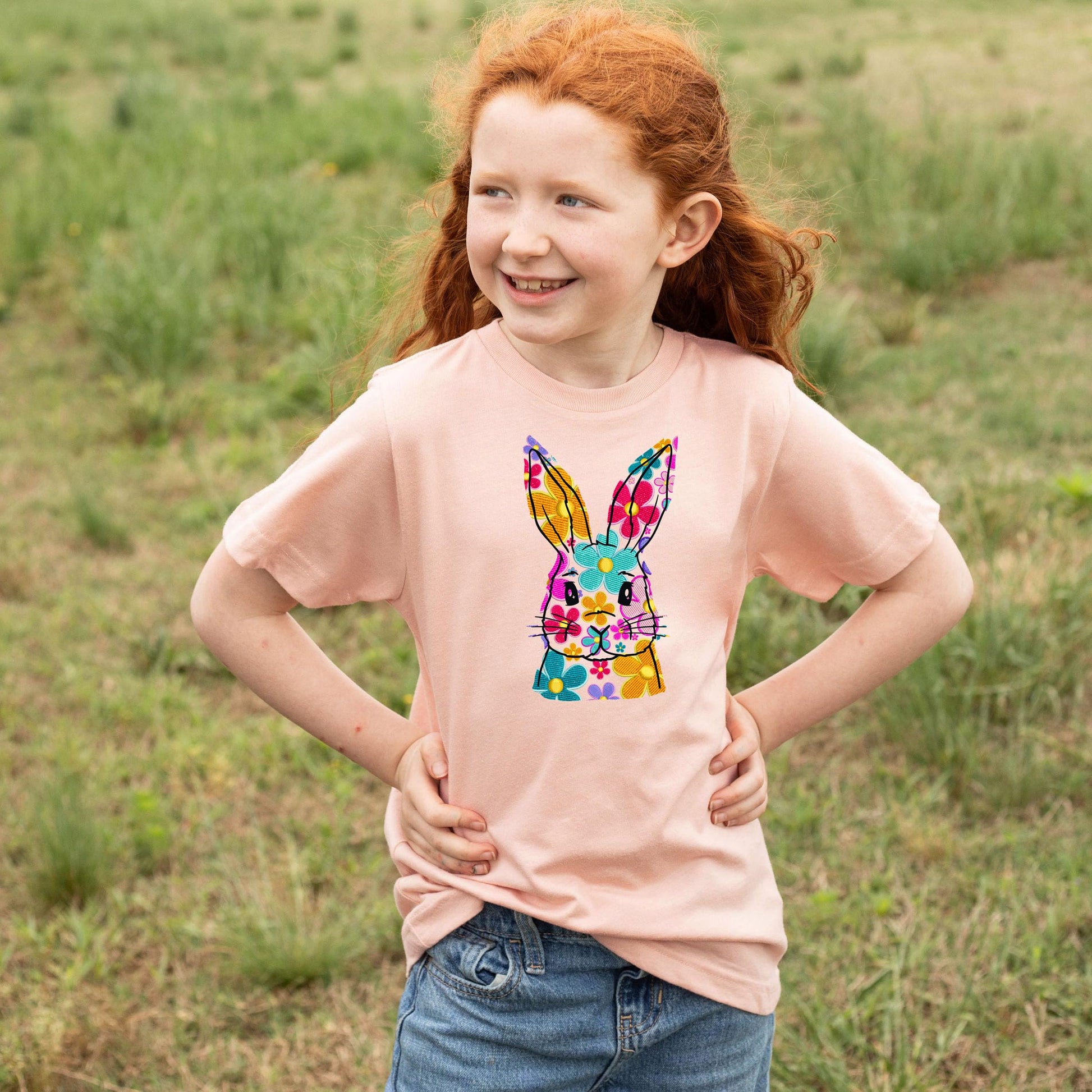 Girls wearing peach floral bunny Easter shirt, fun spring holiday outfit