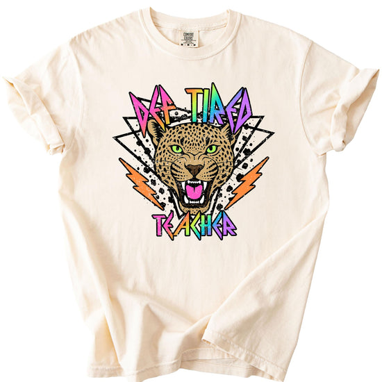 Detail shot of vibrant retro graphic print on Def Tired Teacher ivory tee