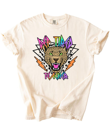 Detail shot of vibrant retro graphic print on Def Tired Teacher ivory tee