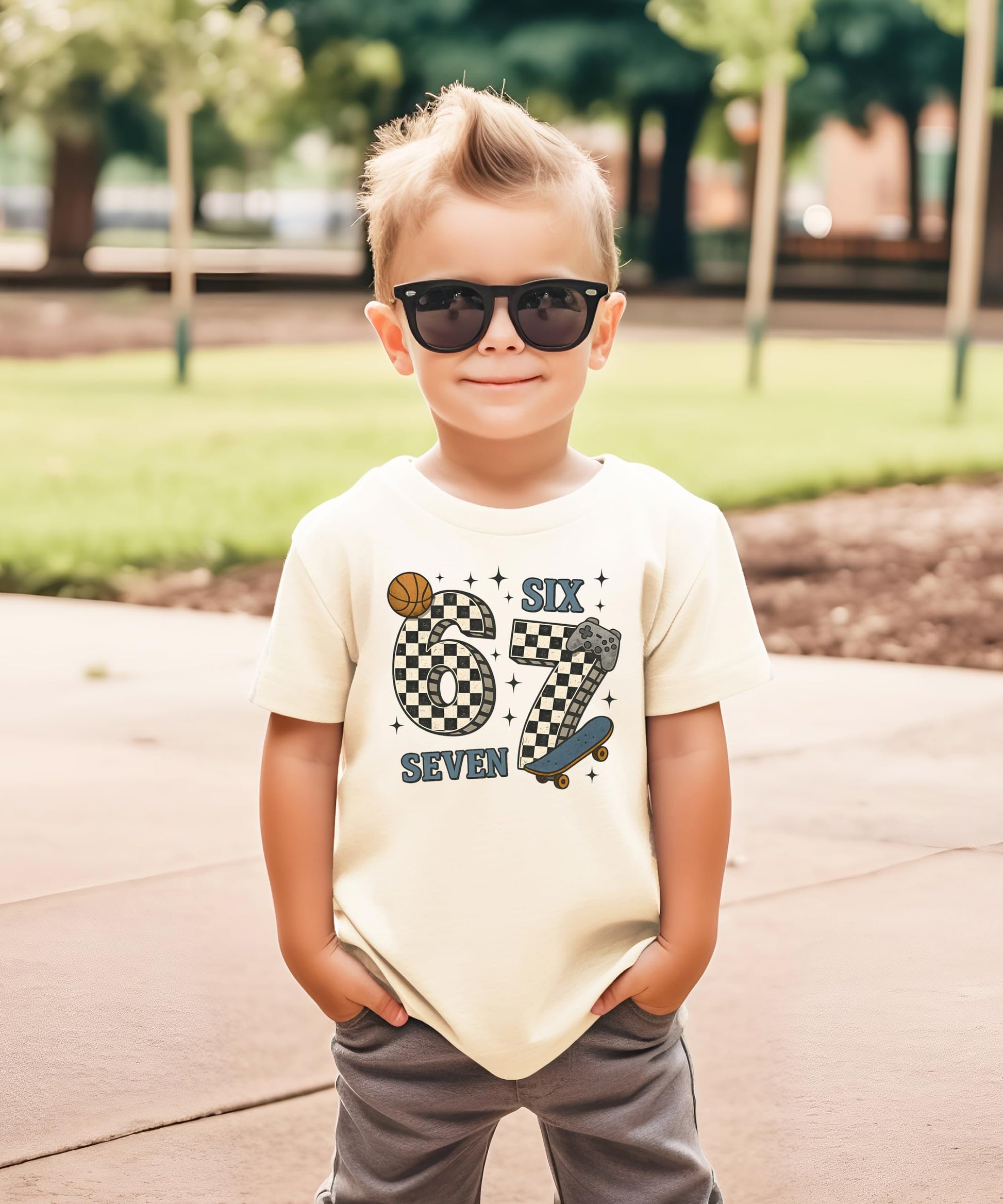 Young boy wearing the 6 7 meme graphic tee in natural color — casual everyday style