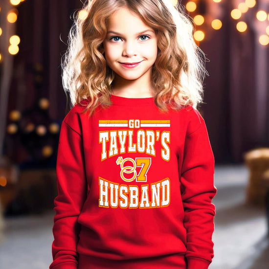 Mom and daughter matching in red Go Taylor's Husband football fan sweatshirts for game day