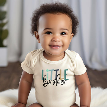 Baby wearing Little Brother bodysuit as part of a matching sibling outfit set for newborns