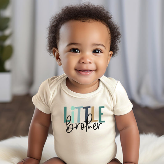 Baby wearing Little Brother bodysuit as part of a matching sibling outfit set for newborns