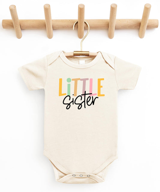 Close-up of Little Sister baby bodysuit print detail on soft natural fabric