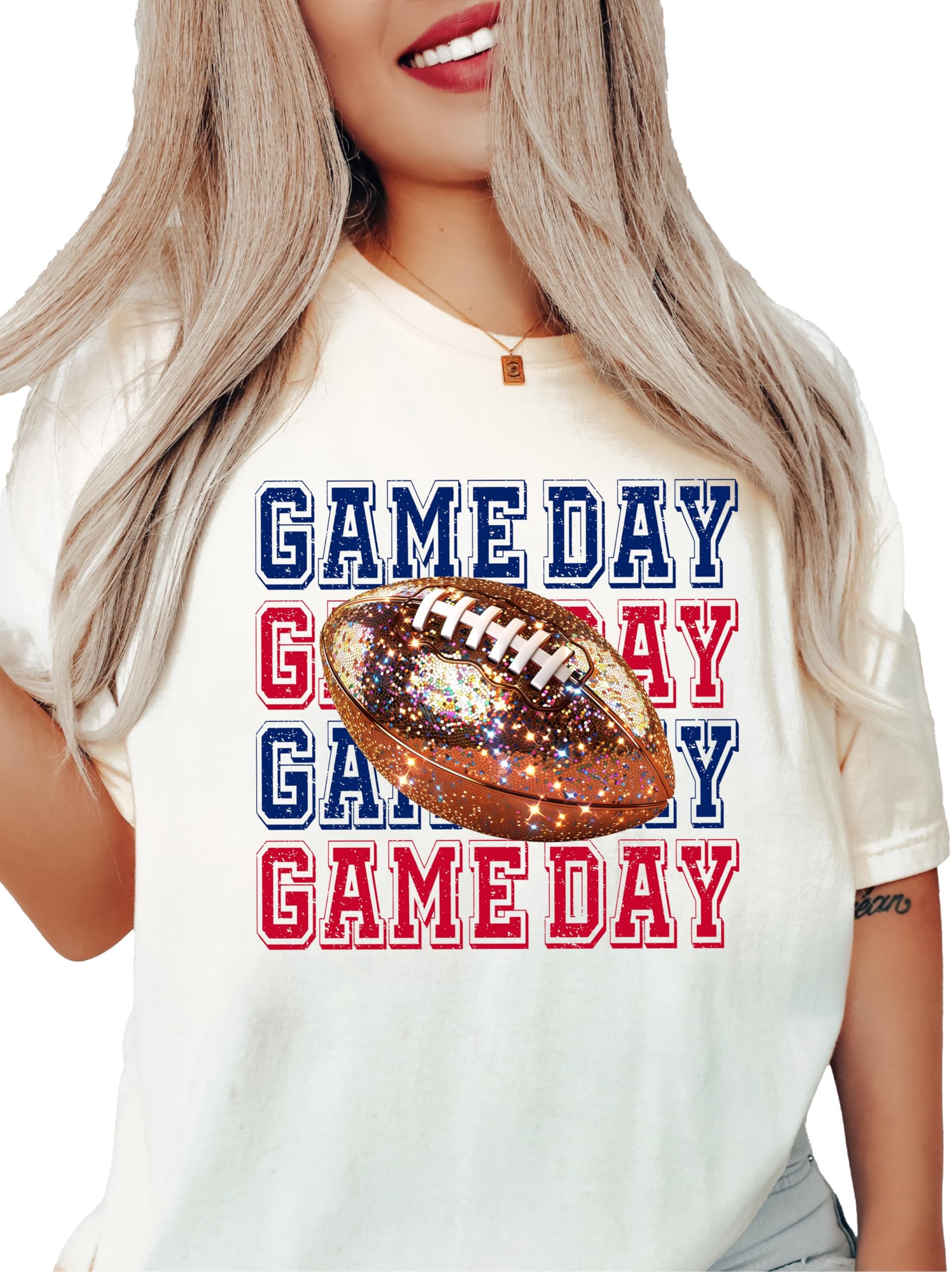 Women's fall football fan pullover with bold faux glitter football design in blue and red