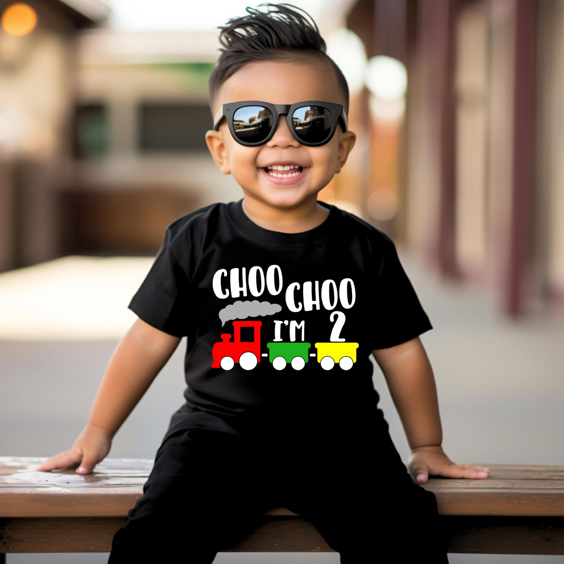 Choo Choo I'm Two toddler birthday tee styled as a second birthday party outfit