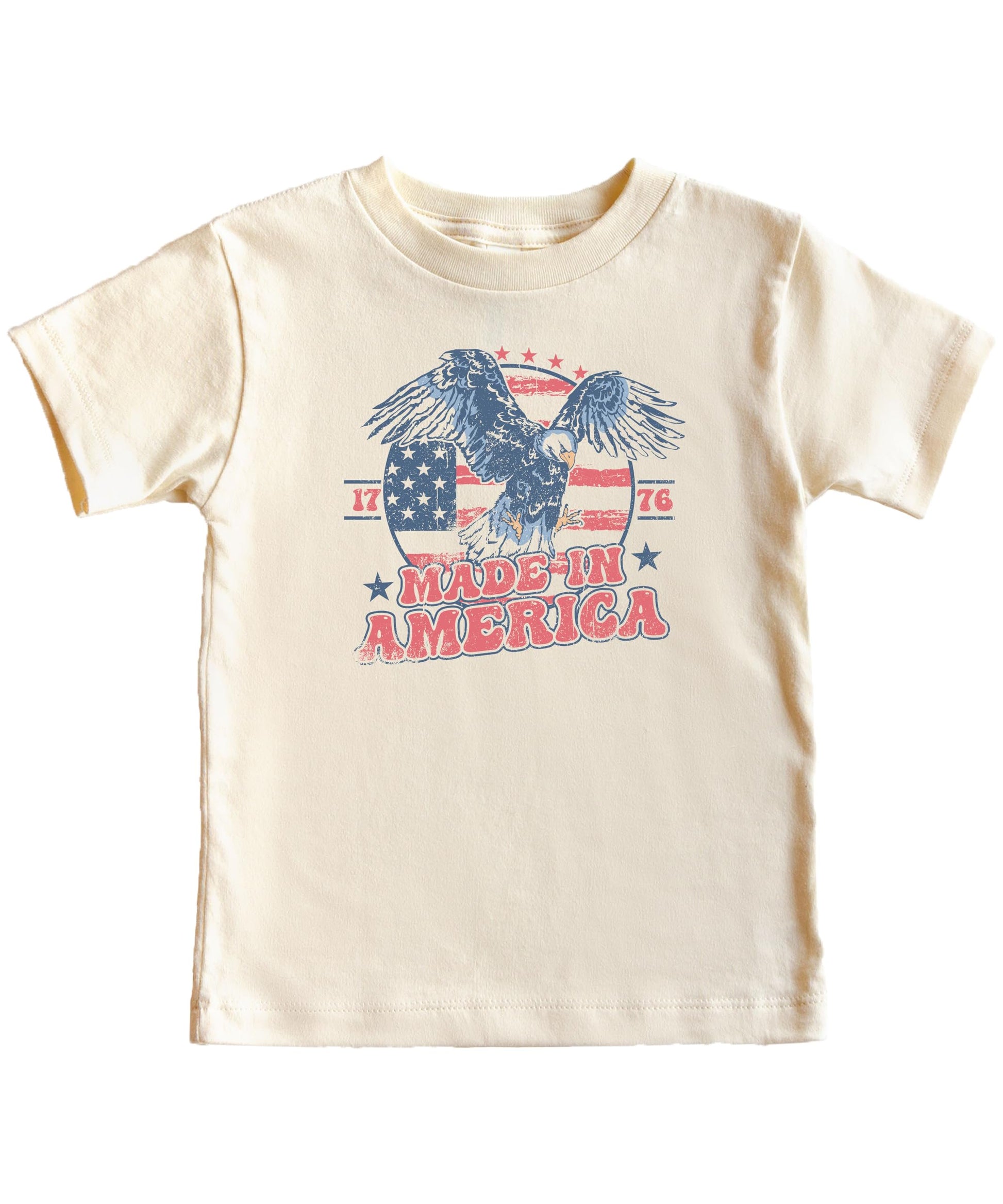 Close-up of vintage eagle and American flag 1776 graphic print on natural cotton tee