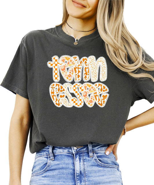 Front view of orange Tennessee fan shirt for women with decorative lace print detail