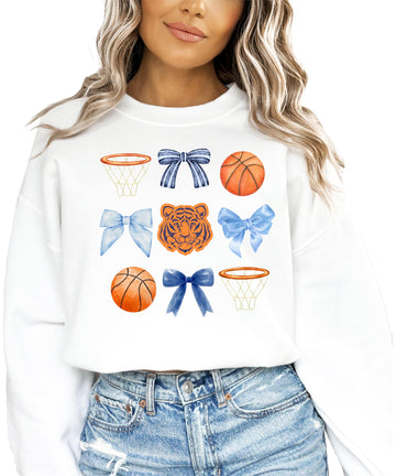 White women's pullover sweatshirt with Tigers mascot, basketballs, and coquette bow graphic design