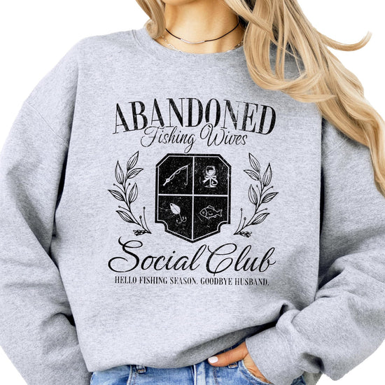 White pullover sweatshirt with Abandoned Fishing Wives Social Club graphic print for women
