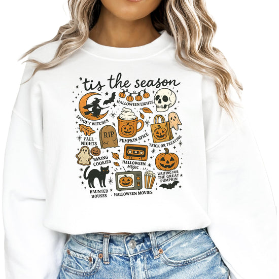 Side view of model in gray Halloween pumpkin ghost sweatshirt showing fit