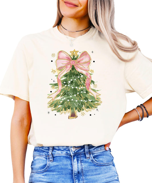 Front view of seafoam holiday shirt with colorful Christmas tree and pink bow graphic