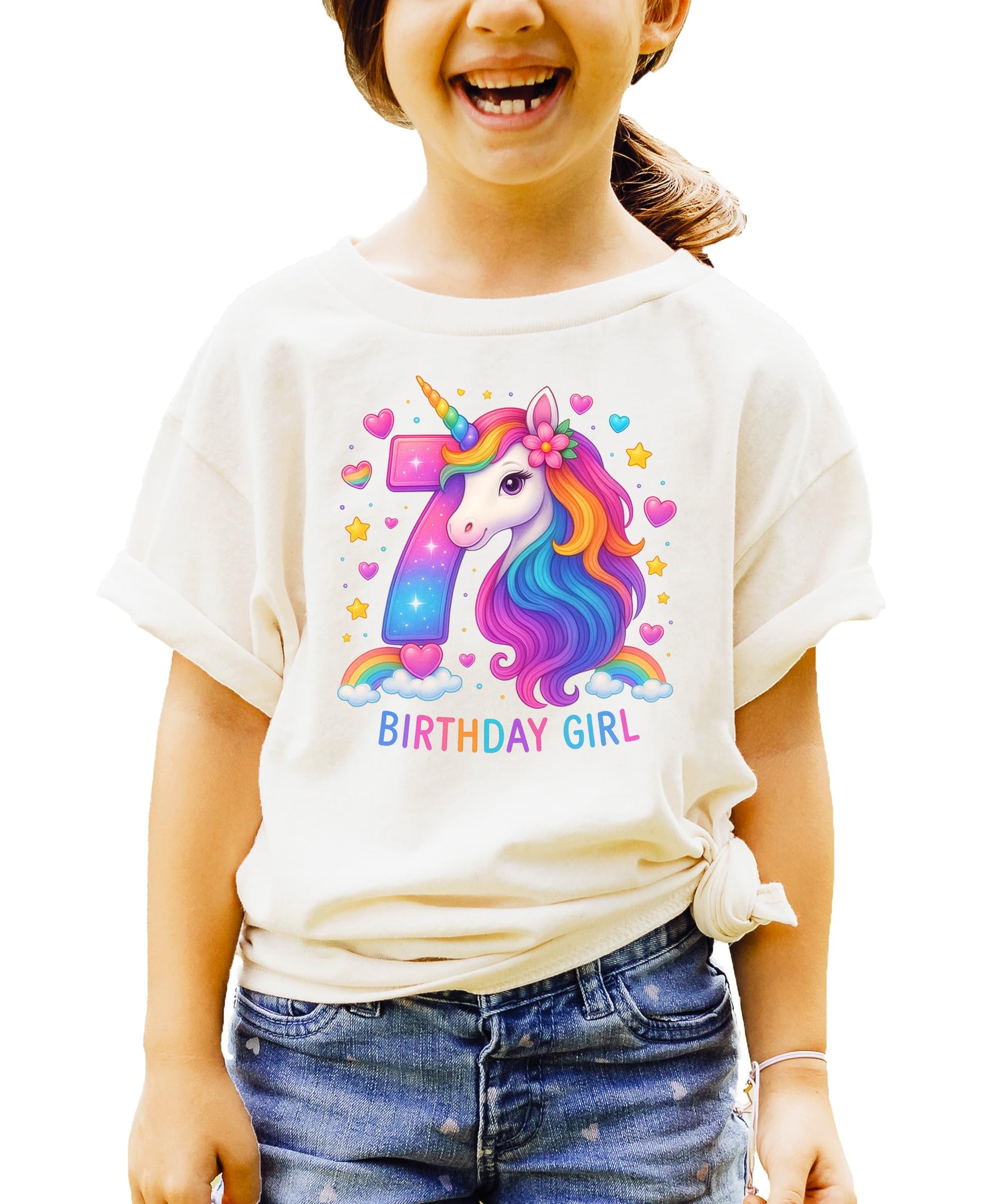Full front view of girls pink unicorn birthday graphic tee with rainbow number seven
