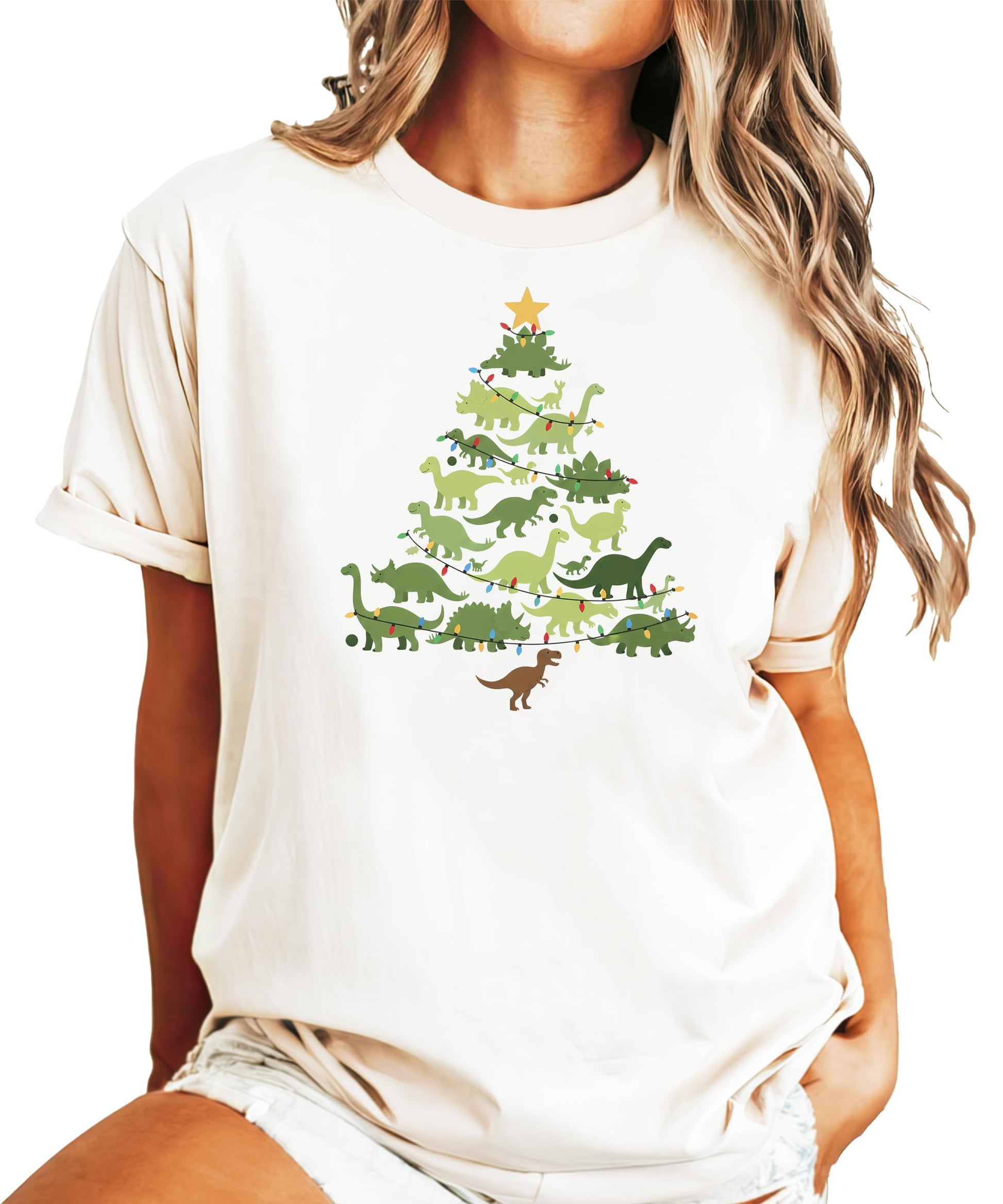 Flat lay of dinosaur Christmas tree shirt showing full design and shirt color options