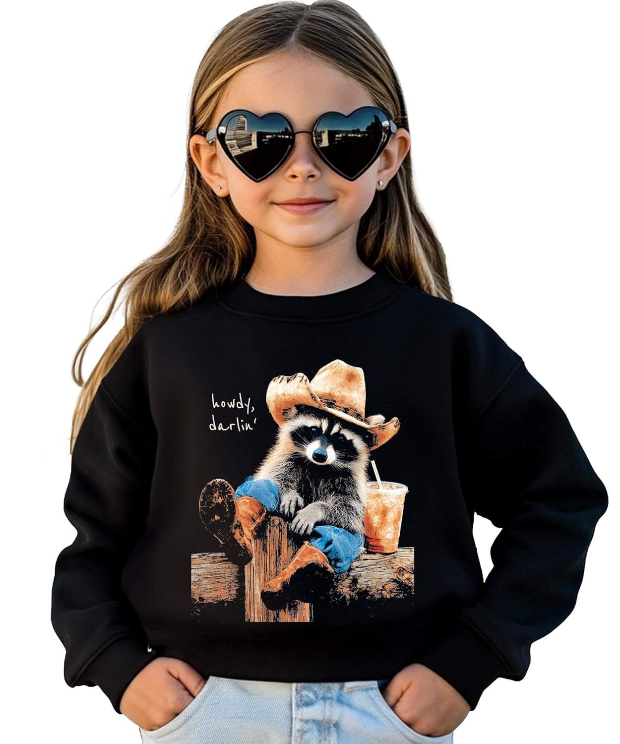 Front view of black unisex crewneck pullover featuring a western-style raccoon cowboy graphic
